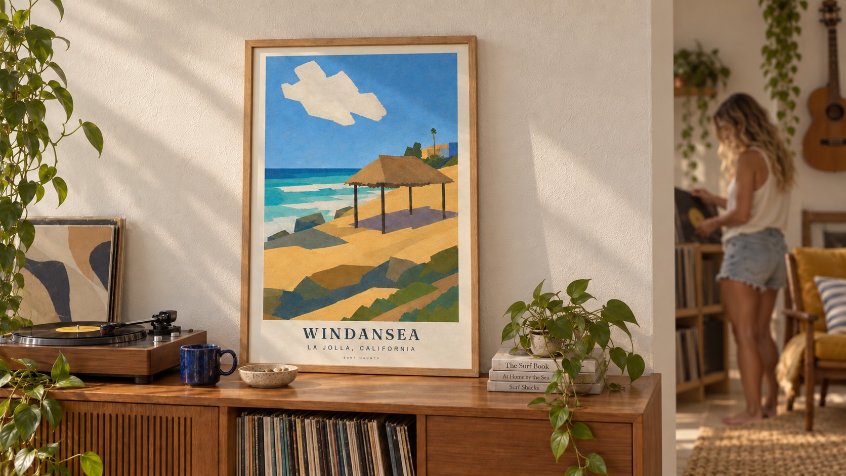 The Windansea poster resting on a sunlit record cabinet